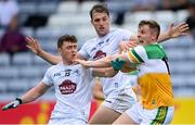 4 July 2021; Johnny Moloney of Offaly in action against Darragh Kirwan, centre, and Jimmy Hyland of Kildare during the Leinster GAA Football Senior Championship Quarter-Final match between Kildare and Offaly at MW Hire O'Moore Park in Portlaoise, Laois. Photo by Piaras Ó Mídheach/Sportsfile