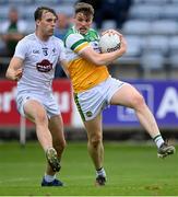 4 July 2021; Johnny Moloney of Offaly in action against Darragh Kirwan of Kildare during the Leinster GAA Football Senior Championship Quarter-Final match between Kildare and Offaly at MW Hire O'Moore Park in Portlaoise, Laois. Photo by Piaras Ó Mídheach/Sportsfile