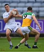 4 July 2021; Eoin Doyle of Kildare in action against Jordan Hayes of Offaly during the Leinster GAA Football Senior Championship Quarter-Final match between Kildare and Offaly at MW Hire O'Moore Park in Portlaoise, Laois. Photo by Piaras Ó Mídheach/Sportsfile