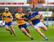 4 July 2021; Jason Forde of Tipperary in action against John Conlon of Clare during the Munster GAA Hurling Senior Championship Semi-Final match between Tipperary and Clare at LIT Gaelic Grounds in Limerick. Photo by Stephen McCarthy/Sportsfile