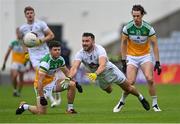 4 July 2021; Fergal Conway of Kildare in action against Bernard Allen, left, and Niall McNamee of Offaly during the Leinster GAA Football Senior Championship Quarter-Final match between Kildare and Offaly at MW Hire O'Moore Park in Portlaoise, Laois. Photo by Piaras Ó Mídheach/Sportsfile