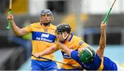 4 July 2021; Tony Kelly of Clare in action against Cathal Barrett of Tipperary during the Munster GAA Hurling Senior Championship Semi-Final match between Tipperary and Clare at LIT Gaelic Grounds in Limerick. Photo by Stephen McCarthy/Sportsfile