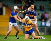 4 July 2021; Aron Shanagher of Clare in action against Padraic Maher, left, and Barry Heffernan of Tipperary during the Munster GAA Hurling Senior Championship Semi-Final match between Tipperary and Clare at LIT Gaelic Grounds in Limerick. Photo by Stephen McCarthy/Sportsfile