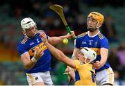 4 July 2021; Aron Shanagher of Clare in action against Padraic Maher, left, and Barry Heffernan of Tipperary during the Munster GAA Hurling Senior Championship Semi-Final match between Tipperary and Clare at LIT Gaelic Grounds in Limerick. Photo by Stephen McCarthy/Sportsfile