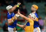 4 July 2021; Aron Shanagher of Clare in action against Padraic Maher, left, and Barry Heffernan of Tipperary during the Munster GAA Hurling Senior Championship Semi-Final match between Tipperary and Clare at LIT Gaelic Grounds in Limerick. Photo by Stephen McCarthy/Sportsfile