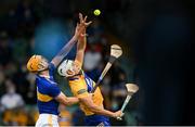 4 July 2021; Aron Shanagher of Clare in action against Barry Heffernan of Tipperary during the Munster GAA Hurling Senior Championship Semi-Final match between Tipperary and Clare at LIT Gaelic Grounds in Limerick. Photo by Stephen McCarthy/Sportsfile