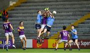 4 July 2021; Peadar Ó Cofaigh Byrne, left, and Tom Lahiff of Dublin contest a kickout with Niall Hughes of Wexford during the Leinster GAA Football Senior Championship Quarter-Final match between Wexford and Dublin at Chadwicks Wexford Park in Wexford. Photo by Brendan Moran/Sportsfile