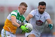 4 July 2021; David Dempsey of Offaly in action against Ryan Houlihan of Kildare during the Leinster GAA Football Senior Championship Quarter-Final match between Kildare and Offaly at MW Hire O'Moore Park in Portlaoise, Laois. Photo by Piaras Ó Mídheach/Sportsfile