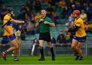 4 July 2021; Cathal Malone, left, and John Conlon appeal to referee James Owens before he awarded a penalty to Tipperary after their team-mate Aidan McCarthy was shown a yellow card during the Munster GAA Hurling Senior Championship Semi-Final match between Tipperary and Clare at LIT Gaelic Grounds in Limerick. Photo by Ray McManus/Sportsfile