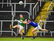 4 July 2021; Bryan McMahon of Meath in action against Daniel Mimnagh of Longford during the Leinster GAA Football Senior Championship Quarter-Final match between Meath and Longford at Páirc Tailteann in Navan, Meath. Photo by Seb Daly/Sportsfile