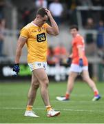 4 July 2021; Mark Sweeney of Antrim leaves the field after receiving a black card during the Ulster GAA Football Senior Championship Quarter-Final match between Armagh and Antrim at the Athletic Grounds in Armagh. Photo by David Fitzgerald/Sportsfile
