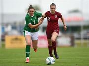 6 July 2021; Jessica Simpson of England in action against Heidi O'Sullivan of Republic of Ireland during the Women's U16 International Friendly match between Republic of Ireland and England at RSC in Waterford. Photo by Harry Murphy/Sportsfile