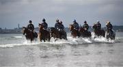 7 July 2021; Horses and riders, from left, Royal Admiral with Cian MacRedmond, Trading Point with Ciara Robinson, Current Option with Ian Brennan, Stellify with Owen Moss, Magnetic North with Tahdg McGuinness, Spanish Tenor with Adam Caffrey, Saltonstall with Aisling McGuinness and Sir Jack Thomas with Zoe Boardman on the gallops at South Beach in Rush, Co. Dublin as trainer Ado McGuinness gears up for the iconic Galway Races Summer Festival that takes place from Monday 26th July to Sunday 1st August. Photo by David Fitzgerald/Sportsfile