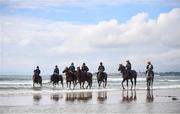 7 July 2021; Horses and riders, from left, Trading Point with Ciara Robinson, Stellify with Owen Moss, Magnetic North with Tahdg McGuinness, Royal Admiral with Cian MacRedmond, Spanish Tenor with Adam Caffrey, Saltonstall with Aisling McGuinness and Sir Jack Thomas with Zoe Boardman  on the gallops at South Beach in Rush, Co. Dublin as trainer Ado McGuinness gears up for the iconic Galway Races Summer Festival that takes place from Monday 26th July to Sunday 1st August. Photo by David Fitzgerald/Sportsfile