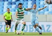 7 July 2021; Richie Towell of Shamrock Rovers in action against Joeri de Kamps of Slovan Bratislava during the UEFA Champions League first qualifying round first leg match between Slovan Bratislava and Shamrock Rovers at Tehelné pole Stadium in Bratislava, Slovakia. Photo by Grega Valancic/Sportsfile