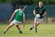 7 July 2021; Stephen Cluxton of Parnells in action against Ciarán Brabazon of O'Tooles during the Go Ahead Adult Football League Division Three North match between Parnells and O'Tooles at Parnells GAA Club in Coolock, Dublin. Photo by Piaras Ó Mídheach/Sportsfile