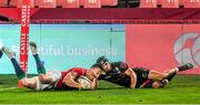 7 July 2021; Josh Adams of British and Irish Lions scores a try despite the tackle of Thaakir Abrahams of Cell C Sharks during the 2021 British and Irish Lions tour match between Cell C Sharks and The British and Irish Lions at Emirates Airline Park in Johannesburg, South Africa. Photo by Sydney Seshibedi/Sportsfile