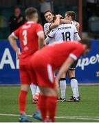 8 July 2021; Will Patching celebrates with his Dundalk team-mates Raivis Jurkovskis, left, and Patrick McEleney, right, during the UEFA Europa Conference League first qualifying round first leg match between Dundalk and Newtown at Oriel Park in Dundalk, Louth. Photo by Stephen McCarthy/Sportsfile
