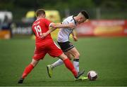 8 July 2021; Darragh Leahy of Dundalk in action against Craig Williams of Newtown during the UEFA Europa Conference League first qualifying round first leg match between Dundalk and Newtown at Oriel Park in Dundalk, Louth. Photo by Stephen McCarthy/Sportsfile