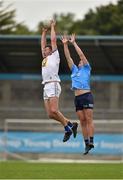 8 July 2021; Eoghan Byrne of Wicklow in action against Mark Lestrange of Dublin during the EirGrid Leinster GAA Football U20 Championship Quarter-Final match between Dublin and Wicklow at Parnell Park in Dublin. Photo by Daire Brennan/Sportsfile
