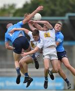 8 July 2021; Sam O’Dowd, left, and Cillian McDonald of Wicklow in action against Seán Foran, left, and Mark O’Leary of Dublin during the EirGrid Leinster GAA Football U20 Championship Quarter-Final match between Dublin and Wicklow at Parnell Park in Dublin. Photo by Daire Brennan/Sportsfile