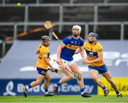 4 July 2021; Michael Breen of Tipperary in action against Aron Shanagher of Clare during the Munster GAA Hurling Senior Championship Semi-Final match between Tipperary and Clare at LIT Gaelic Grounds in Limerick. Photo by Stephen McCarthy/Sportsfile