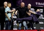 8 July 2021; Conor McGregor, right, and Dustin Poirier are kept apart by UFC President Dana White during a press conference ahead of UFC 264 at the T-Mobile Arena in Las Vegas, Nevada, USA. Photo by Thomas King/Sportsfile