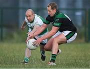 7 July 2021; Richie Walker of O'Tooles in action against Stephen Duffy of Parnells during the Go Ahead Adult Football League Division Three North match between Parnells and O'Tooles at Parnells GAA Club in Coolock, Dublin. Photo by Piaras Ó Mídheach/Sportsfile