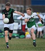 7 July 2021; Harry Gardiner of Parnells in action against Cian Wilson of O'Tooles during the Go Ahead Adult Football League Division Three North match between Parnells and O'Tooles at Parnells GAA Club in Coolock, Dublin. Photo by Piaras Ó Mídheach/Sportsfile