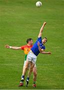 27 June 2021; Michael Quinn of Longford in action against John Murphy of Carlow during the Leinster GAA Football Senior Championship Round 1 match between Carlow and Longford at Bord Na Mona O’Connor Park in Tullamore, Offaly. Photo by Eóin Noonan/Sportsfile