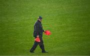 4 July 2021; Roscommon selector Mark Dowd marks the pitch for the warm-up in the rain before the Connacht GAA Football Senior Championship Semi-Final match between Roscommon and Galway at Dr Hyde Park in Roscommon. Photo by Harry Murphy/Sportsfile