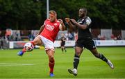 9 July 2021; Paddy Barrett of St Patrick's Athletic in action against James Akintunde of Derry City during the SSE Airtricity League Premier Division match between St Patrick's Athletic and Derry City at Richmond Park in Dublin. Photo by Stephen McCarthy/Sportsfile