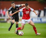 9 July 2021; Darragh Burns of St Patrick's Athletic in action against Ciarán Coll of Derry City during the SSE Airtricity League Premier Division match between St Patrick's Athletic and Derry City at Richmond Park in Dublin. Photo by Stephen McCarthy/Sportsfile
