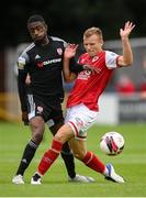9 July 2021; Jamie Lennon of St Patrick's Athletic in action against Junior Ogedi-Uzokwe of Derry City during the SSE Airtricity League Premier Division match between St Patrick's Athletic and Derry City at Richmond Park in Dublin. Photo by Stephen McCarthy/Sportsfile