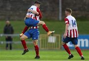 9 July 2021; William Armshaw of Treaty United, left, celebrates after scoring his side's first goal with team-mates Joe Collins and Sean Guerins during the SSE Airtricity League First Division match between Treaty United and Shelbourne at Markets Field in Limerick. Photo by Michael P Ryan/Sportsfile