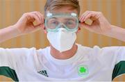 10 July 2021; Team Ireland swimmer Shane Ryan, wearing a face mask and protective eye goggles, at Dublin Airport on their departure for the Tokyo 2020 Olympic Games. Photo by Ramsey Cardy/Sportsfile