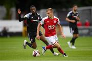 9 July 2021; Jamie Lennon of St Patrick's Athletic in action against Junior Ogedi-Uzokwe of Derry City during the SSE Airtricity League Premier Division match between St Patrick's Athletic and Derry City at Richmond Park in Dublin. Photo by Stephen McCarthy/Sportsfile