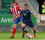9 July 2021; John Ross Wilson of Shelbourne in action against Anthony O'Donnell of Treaty United during the SSE Airtricity League First Division match between Treaty United and Shelbourne at Markets Field in Limerick. Photo by Michael P Ryan/Sportsfile