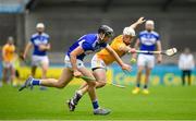 10 July 2021; Paddy Purcell of Laois in action against Paddy Burke of Antrim during the GAA Hurling All-Ireland Senior Championship preliminary round match between Antrim and Laois at Parnell Park in Dublin. Photo by Seb Daly/Sportsfile