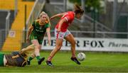 10 July 2021; Bríd O'Sullivan of Cork shoots past Meath goalkeeper Monica McGuirk and Orlagh Lally to score a first half goal during the TG4 All-Ireland Senior Ladies Football Championship Group 2 Round 1 match between Cork and Meath at St Brendan's Park in Birr, Offaly. Photo by Ray McManus/Sportsfile