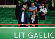 10 July 2021; An Taoiseach Micheál Martin TD and his wife Mary O'Shea stand for Amhrán na bhFiann before the Munster GAA Football Senior Championship Semi-Final match between Limerick and Cork at the LIT Gaelic Grounds in Limerick. Photo by Harry Murphy/Sportsfile