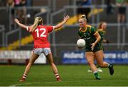 10 July 2021; Vikki Wall of Meath in action against Orla Finn of Cork  during the TG4 All-Ireland Senior Ladies Football Championship Group 2 Round 1 match between Cork and Meath at St Brendan's Park in Birr, Offaly. Photo by Ray McManus/Sportsfile