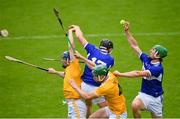 10 July 2021; Ross King of Laois, right, and team-mate PJ Scully, in action against Antrim's Gerard Walsh and Stephen Rooney during the GAA Hurling All-Ireland Senior Championship preliminary round match between Antrim and Laois at Parnell Park in Dublin. Photo by Seb Daly/Sportsfile