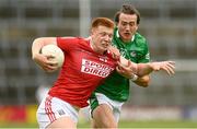10 July 2021; Brian Hartnett of Cork in action against Cian Sheehan of Limerick during the Munster GAA Football Senior Championship Semi-Final match between Limerick and Cork at the LIT Gaelic Grounds in Limerick. Photo by Harry Murphy/Sportsfile