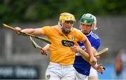 10 July 2021; Conor Johnston of Antrim in action against Sean Downey of Laois during the GAA Hurling All-Ireland Senior Championship preliminary round match between Antrim and Laois at Parnell Park in Dublin. Photo by Seb Daly/Sportsfile
