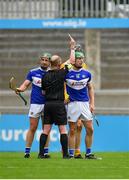 10 July 2021; Ross King of Laois, right, is shown a red card by referee Sean Cleere during the GAA Hurling All-Ireland Senior Championship preliminary round match between Antrim and Laois at Parnell Park in Dublin. Photo by Seb Daly/Sportsfile