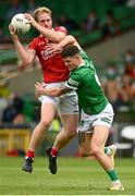 10 July 2021; Ruairi Deane of Cork in action against Iain Corbett of Limerick during the Munster GAA Football Senior Championship Semi-Final match between Limerick and Cork at the LIT Gaelic Grounds in Limerick. Photo by Harry Murphy/Sportsfile