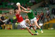 10 July 2021; Ruairi Deane of Cork in action against Iain Corbett of Limerick during the Munster GAA Football Senior Championship Semi-Final match between Limerick and Cork at the LIT Gaelic Grounds in Limerick. Photo by Harry Murphy/Sportsfile