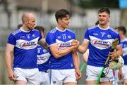 10 July 2021; Laois players, from left, Ciaran McEvoy, James Ryan and Ryan Mullaney after their side's victory over Antrim in their GAA Hurling All-Ireland Senior Championship preliminary round match at Parnell Park in Dublin. Photo by Seb Daly/Sportsfile