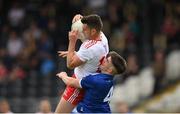 10 July 2021; Darren McCurry of Tyrone in action against Cian Reilly of Cavan during the Ulster GAA Football Senior Championship quarter-final match between Tyrone and Cavan at Healy Park in Omagh, Tyrone. Photo by Stephen McCarthy/Sportsfile